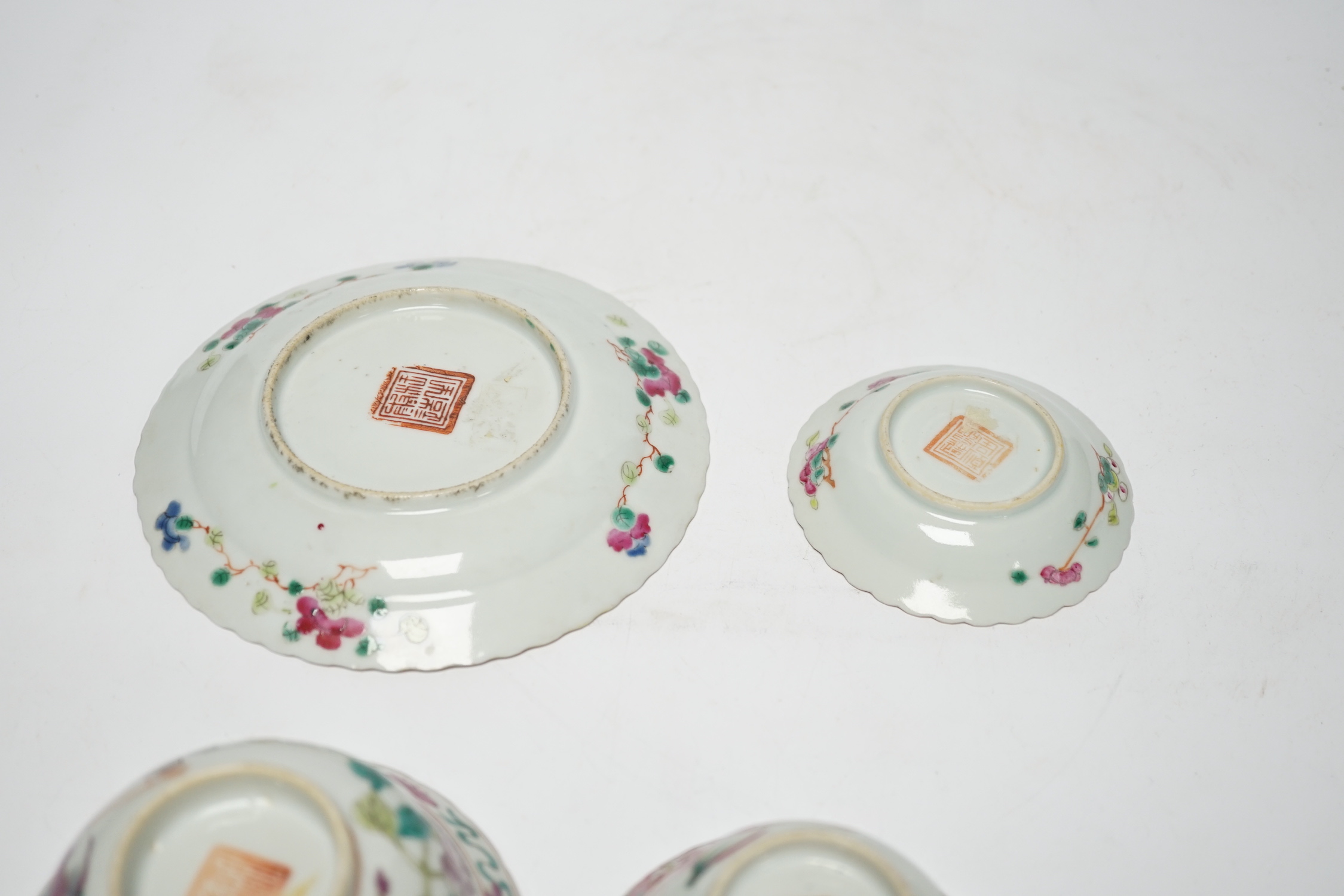 Two Chinese Straits Nonya ware famille rose tea bowls, larger 11cm diameter, and two saucer dishes, Guangxu period